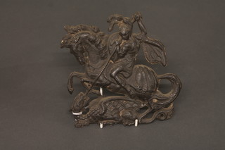 A lead plaque depicting St George slaying the dragon 7"