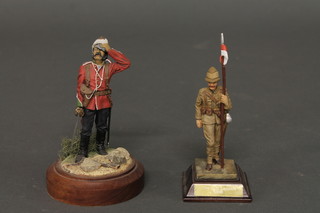 A figure of a standing soldier with sword 4" together with figure of a  21st Lancer