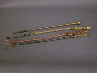 3 brass pokers and a copper toasting fork