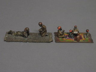 An Austrian cold painted bronze figure group - The Koran  Lesson 3" and 1 other of 2 figures playing dice on a rug 4"