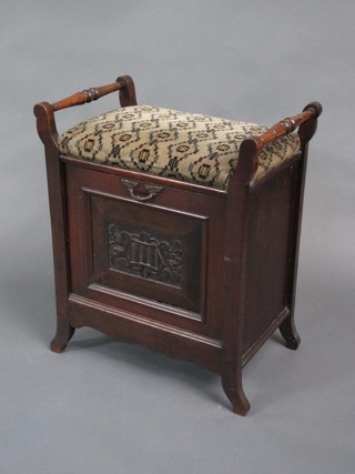 A Victorian mahogany piano stool, the base fitted a music Canterbury