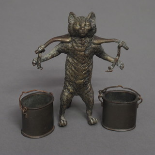 A bronze vesta stand in the form of a standing cat with yoke and  2 pails 4"