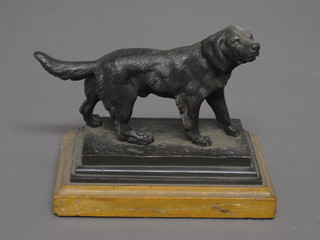 A bronze figure of a standing setter, raised on a marble base  6"