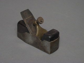 A metal framed rosewood smoothing plane