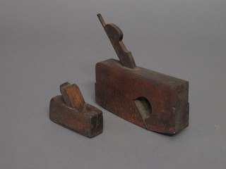 A small wooden smoothing plane 3" and 1 other 7"
