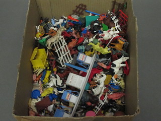 A collection of various plastic figures of animals etc