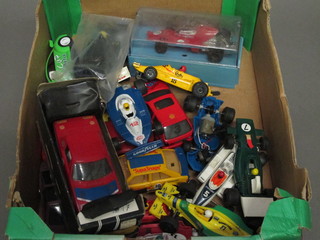 A collection of Scalextric style cars