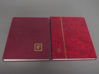 2 red stock books of various stamps