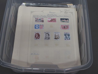 A collection of stamps contained in a plastic crate