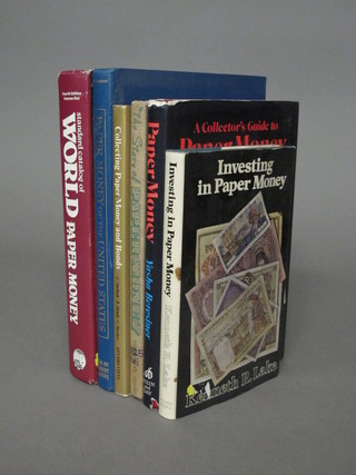 A collection of various books relating to bank notes