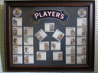A set of 50 framed Players cigarette cards - History of Naval Dress, 18" x 23" contained in 2 frames