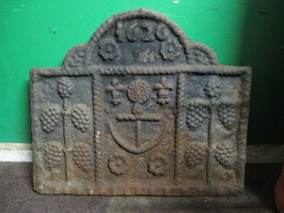 A cast iron fire back decorated anchors, marked 1626, 30"
