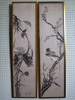 A pair of embroidered panels on silk decorated birds amidst  branches 38" x 9"