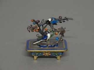 An Oriental cloisonne enamel figure of bush with birds amidst branches 4"