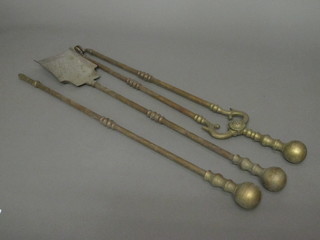 A brass 3 piece fireside companion set comprising pair of tongs,  poker and shovel