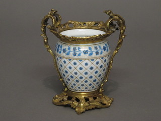 A Continental porcelain vase with gilt metal mounts, the base monogrammed LP and marked SV 46, 4"