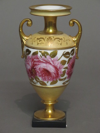 A Continental twin handled porcelain vase with floral decoration and gilt banding 7 1/2"