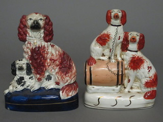 A Staffordshire flat back figure of 2 seated Spaniels 8" and 1  other Staffordshire group of Spaniels, chipped to base,