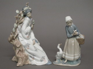 A Lladro figure of a seated Geisha girl 11", fan f, and 1 other Lladro figure of a standing girl with basket and ducks 9"