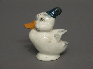 An Art Deco Shorter pottery pepper pot in the form of a seated duck 4"