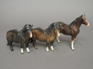 2 Beswick figures of standing Ponies, ears chipped and a bay horse, leg f and r,