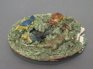 A circular Majolica reptile plate decorated crocodiles and turtle, 7", heavily f,