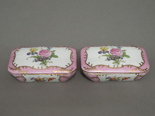 A pair of rectangular pink and floral patterned porcelain trinket  boxes and covers, 5"
