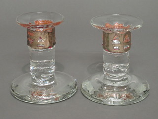 A pair of stub shaped Art Glass candlesticks, the bases signed 5"