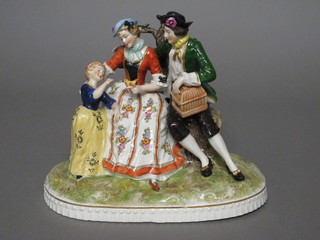 A German figure of a seated lady and gentleman with child 9"