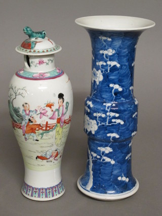 An Oriental blue and white vase decorated prunus, the base with  4 character mark 11" together with an Oriental urn and cover  decorated figures, the base with seal mark 11", chip to rim,
