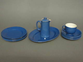 A 16 piece blue glazed Moorcroft tea service comprising 12"  oval platter, 4 plates 8", hotwater jug - chipped, 5 cups and 5  saucers