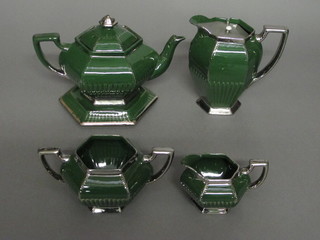A Victorian green glazed 4 piece tea service with octagonal  teapot and stand, hotwater jug, twin handled sugar bowl and milk  jug