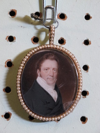 18th Century portrait miniature "Nobleman with White Stock and  Black Jacket" contained in a gilt metal frame with demi-pearl  decoration 2"  ILLUSTRATED