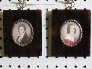 A pair of portrait miniatures "Lady and Gentleman" 2" contained in tortoiseshell finished frames