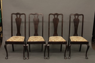 A set of 4 mahogany Queen Anne style slat back dining chairs  with upholstered drop in seats, raised on cabriole supports