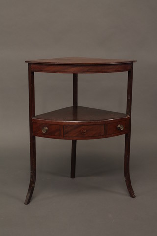 A Georgian mahogany corner wash stand, the base fitted an undertier raised on outswept supports 24"