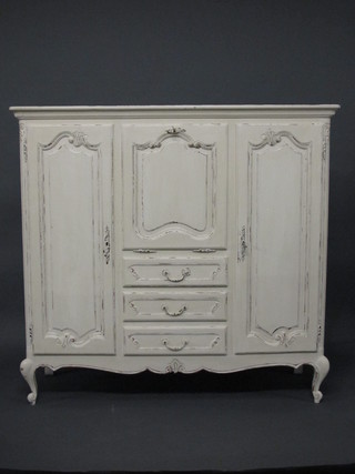 A Continental white painted cocktail cabinet above 3 long  drawers flanked by a pair of cupboards, raised on cabriole  supports 55"