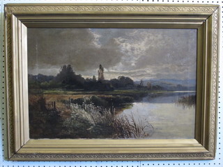 19th Century oil on canvas "River with Hill in Distance" 15" x  24" contained in a gilt frame