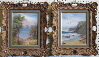 A pair of oil on boards "Beach with Birds and Wooded Lake" 9"  x 7" contained in a decorative gilt frames