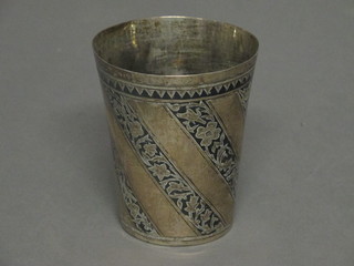 A white metal beaker with niello decoration