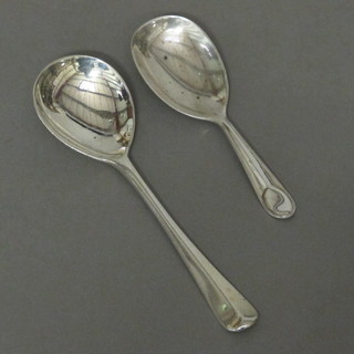 A silver caddy spoon Sheffield 1928 and a silver jam spoon  London 1949, 1 ozs