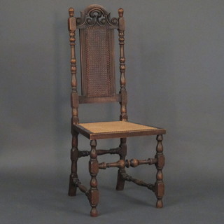 A Carolean style beach framed high back chair with woven rush  seat and back, raised on turned and block supports