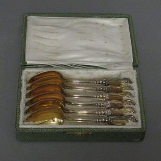 A set of 6 Continental gilt metal coffee spoons, cased