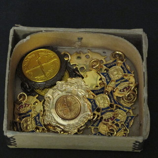 A collection of various gilt metal shooting medals