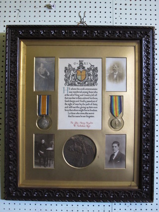 A pair comprising British War medal and Victory medal to Pte. John Henry Hayden West Yorkshire Regt., complete with Death  plaque, certificate and 4 photographs of the recipients family, all  contained within 1 frame