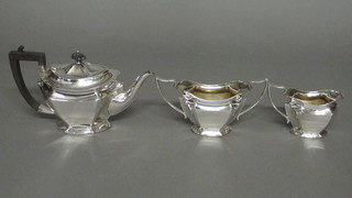 A shaped 3 piece silver plated tea service comprising teapot, sugar bowl and cream jug