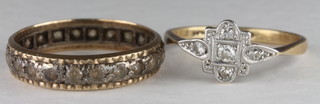 An 18ct gold dress ring set diamonds together with an eternity  ring