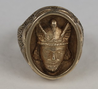 A 9ct gold signet ring with mask decoration