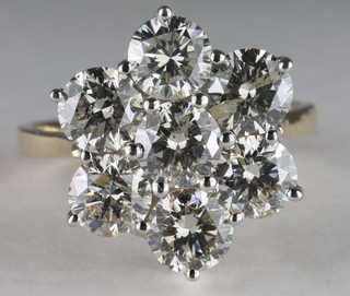 An 18ct white gold diamond cluster ring, set 7 diamonds,  approx 3.30ct