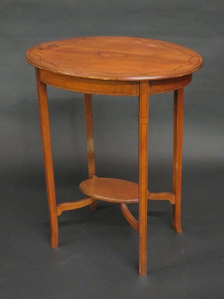 An Edwardian oval inlaid mahogany 2 tier occasional table with undertier, raised on outswept supports 24"   ILLUSTRATED